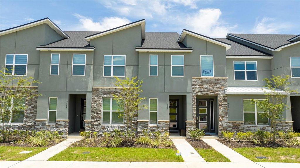 Photo of 1692 Tropical Palms Circle, Kissimmee, FL 34747 (MLS # O6398257)