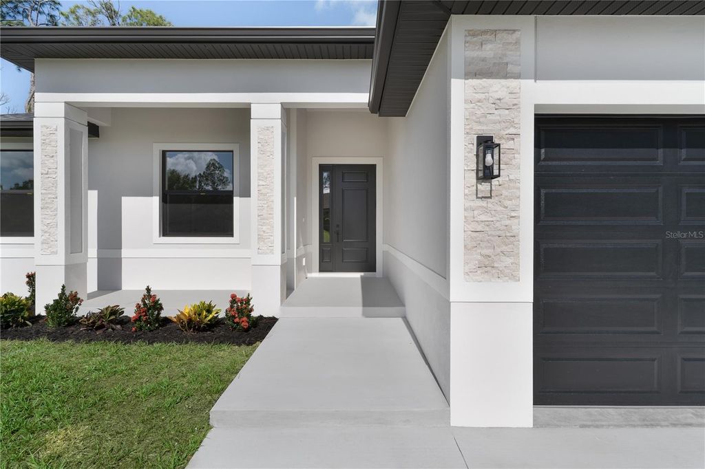 Photo of 65 Albritton Street, Port Charlotte, FL 33953 (MLS # A4694523)