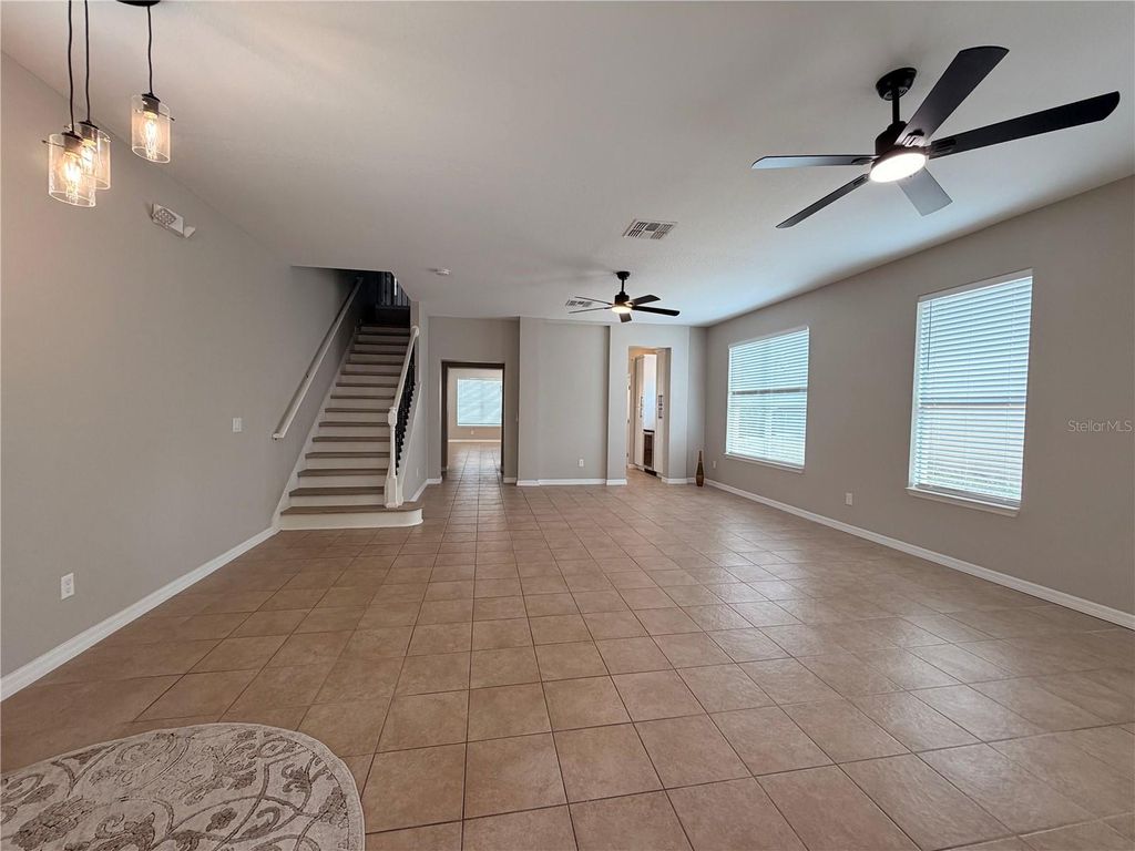 Photo of 528 Orange Cosmos Boulevard, Davenport, FL 33837 (MLS # O6402196)