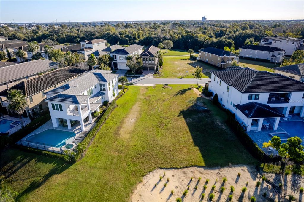 Photo of 1188 Castle Pines Court, Reunion, FL 34747 (MLS # O6356660)