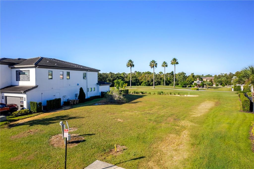 Photo of 1188 Castle Pines Court, Reunion, FL 34747 (MLS # O6356660)