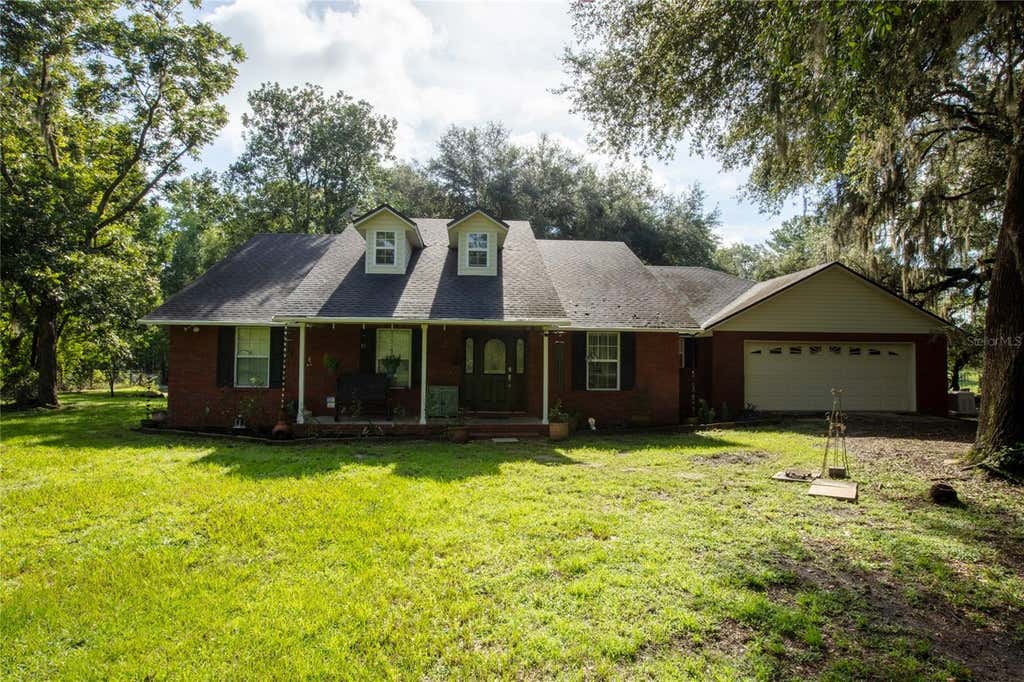 Photo of 9284 NW County Road 225, Starke, FL 32091 (MLS # GC542450)