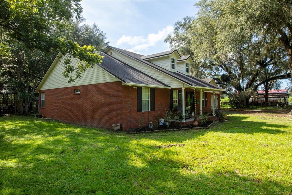 Photo of 9284 NW County Road 225, Starke, FL 32091 (MLS # GC542450)