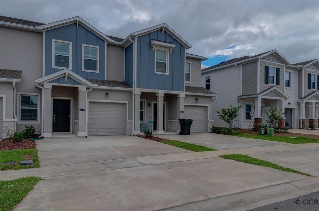 Photo of 3149 Laurent Loop, Davenport, FL 33837 (MLS # O6441932)