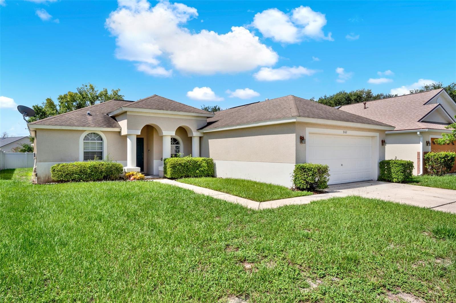 Welcome to 3167 Wood Rose Way – Your Peaceful Retreat in Deltona, FL!
Nestled in a quiet neighborhood, this charming single-story ranch-style home offers 3 cozy bedrooms and 2 bathrooms, ideal for comfortable living. The spacious primary suite features a walk-in closet and an en-suite bath complete with dual sinks, a relaxing soaking tub, and a separate shower.
Step inside to a warm and welcoming atmosphere, with large windows that flood the space with natural light and offer tranquil views of the lush greenery outside. Enjoy versatile living areas including a separate formal dining room, a casual dinette, and a spacious living room—perfect for everyday living or entertaining guests.
The kitchen is a chef’s delight, featuring 42-inch wood cabinets with crown molding, sleek stainless steel appliances, and ample counter space. Additional highlights include an inside laundry room, a two-car garage, and a partially fenced backyard offering privacy and room to enjoy the outdoors.
Don't miss this opportunity to own a lovely home with timeless charm and modern comfort!