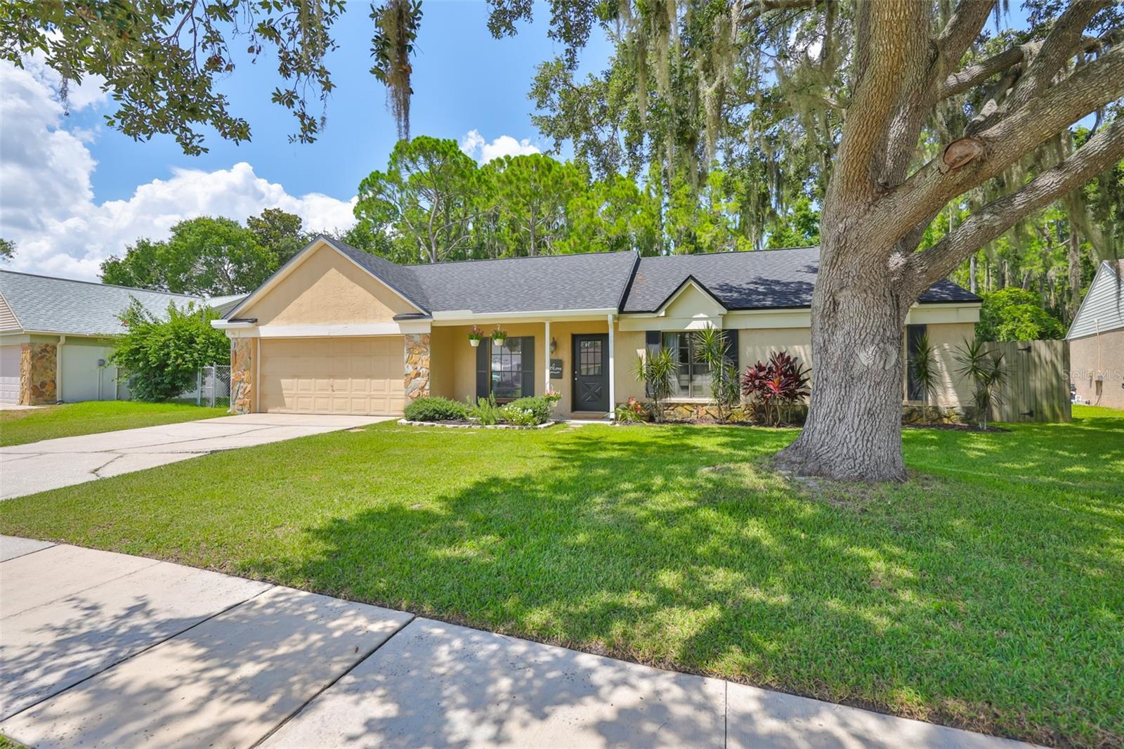 Welcome to this charming and well-maintained 3-bedroom, 2-bathroom home nestled in a quiet and friendly neighborhood with a voluntary HOA, offering flexibility and peace of mind with no mandatory fees. This home has been thoughtfully updated and laid out to provide both functionality and comfort, perfect for families, first-time buyers, or anyone looking to enjoy easy living in a convenient location.
Step inside to a bright and airy open-plan kitchen and living room, where natural light flows effortlessly through the space. The kitchen was fully renovated in 2021 and features beautiful granite countertops, updated cabinetry, and a spacious breakfast bar that’s ideal for casual meals, entertaining guests, or staying connected with family while cooking. The main living area boasts new flooring, also installed in 2021, giving the space a fresh and modern feel. A separate dining room provides a more formal setting for family dinners or holiday gatherings, while a dedicated laundry room offers added convenience tucked away from the main living areas.
Each of the three bedrooms offers a comfortable and private retreat, and both bathrooms are well-appointed and functional. The home has been carefully maintained with major system upgrades including a new roof installed in 2024 and a new outdoor A/C unit added in 2025, offering peace of mind for years to come.
One of the standout features of this property is the large screened-in porch, perfect for enjoying morning coffee, evening relaxation, or hosting friends and family year-round. The fully fenced backyard offers privacy and plenty of space for pets, play, or gardening.
A spacious 2-car garage provides ample room for vehicles, storage, or even a small workshop. With a smart layout, stylish updates, and inviting outdoor living spaces, this home is move-in ready and offers comfort, convenience, and long-term value in a desirable location.