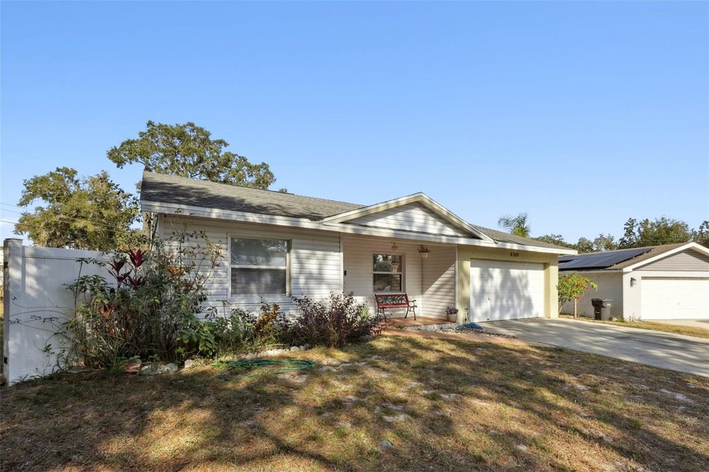 Photo of 6309 Timucuans Drive, Lakeland, FL 33813 (MLS # TB8456343)