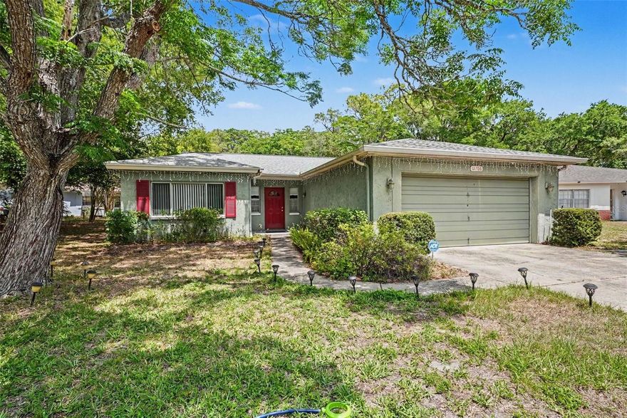 Tucked away on a quiet cul-de-sac, this home offers a rare blend of privacy and scenic surroundings, with a tranquil pond just across the street and no neighbors directly in front or behind. Roof 2025 . Inside, you’ll find thoughtful features throughout, including a spacious walk-in closet and ceiling fans in every room (seven in total) for year-round comfort.

Step outside to enjoy a large, non-vinyl pool enclosed within a screened lanai, featuring brand-new screening completed just one year ago—perfect for relaxing or entertaining. Additional highlights include a full sprinkler system, an intercom system, and a reverse osmosis water filtration system for enhanced water quality.

This property combines comfort, functionality, and a peaceful setting—an exceptional place to call home.