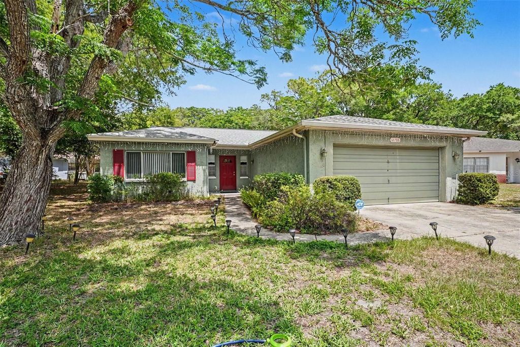 Photo of 12706 Whisper Circle, Hudson, FL 34667 (MLS # TB8502605)