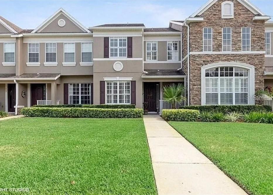 Beautifully customized 2-story 3BR/2.5BA townhome in gated Wekiva community of Longwood. Impeccably clean. Alley entry with a spacious front yard creates a distance from the street. Centrally located unit across the street from mailboxes. Attached 2-car garage with back entrance. Covered courtyard separates the living area from the garage. This spacious property features high ceilings, abundant natural light, and numerous upgrades throughout. The kitchen boasts custom 42" cherry cabinets with pull-out shelves, new granite countertops, and large entertaining bar. New energy-efficient A/C unit. New top-of-the-line Samsung washer and Dryer. Plantation shutters windows. The community has beautiful mature landscaping and is impeccably maintained. Lawn care included. Pet-friendly with approval. Common area pond, gazebo and walking trail. Easily accessible to commute, and close to shopping.