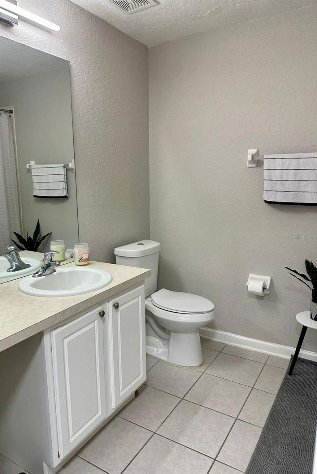 Photo of 6440 Axeitos Terrace #106, Orlando, FL 32835 (MLS # S5142287)