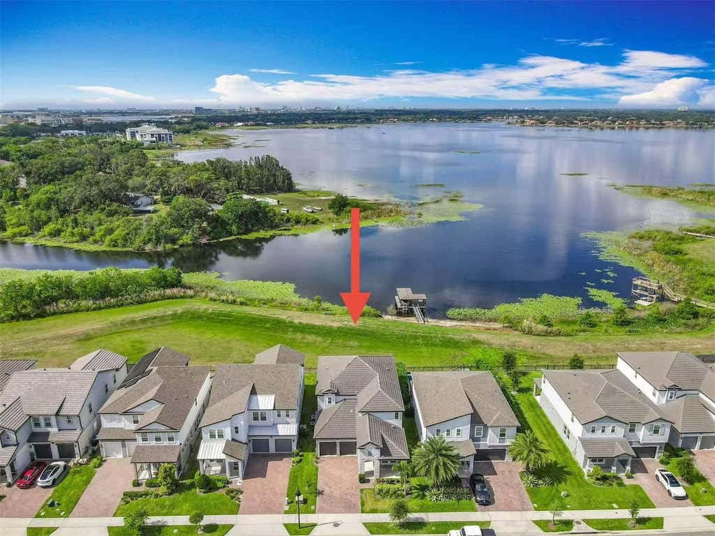 Photo of 7398 Alpine Butterfly Ln, Orlando, FL 32819 (MLS # O6425283)