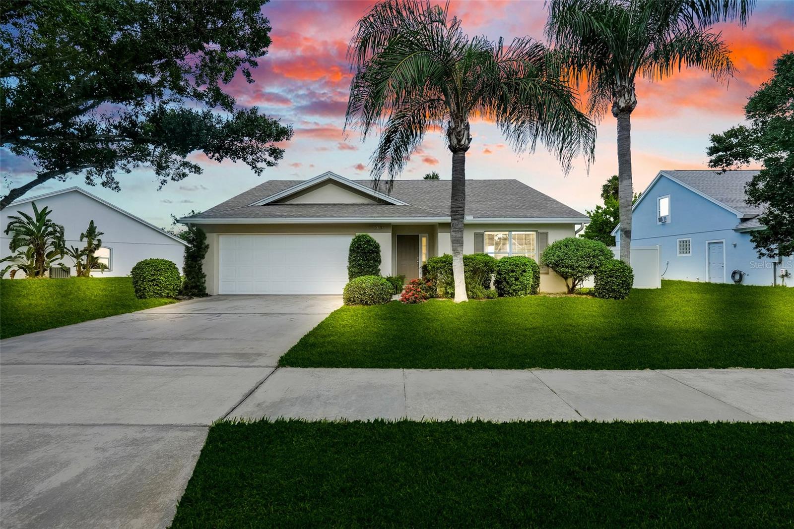 Welcome to this lovely lake front home in Winter Garden's most desirable lakefront gated community, just minutes from the fun in downtown and Winter Garden village. As you arrive, the front covered patio creates a sense of home as you are greeted by the light filled foyer and high ceilings. Upon entry, enjoy the gorgeous lake view! The open concept floor plan features the great room which flows into the eat-in-kitchen with breakfast bar and pantry. Off of the kitchen is the covered, screened patio with lake front views inviting you to relax and enjoy life. The spacious primary suite features a garden tub, separate shower and walk-in closet. The ample second bedroom has lake views and adjacent bath. You will appreciate the recent reroof in 2017, water heater 2023 and fresh paint. Enjoy the Winter Garden lifestyle-nearby scenic 22-mile Winter Garden trail, farmers market, eateries, boutiques, live music and quick access to all of Central Florida living. The community also offers a fishing pier and gazebo. Don't miss out on this great home. Schedule your private showing today.