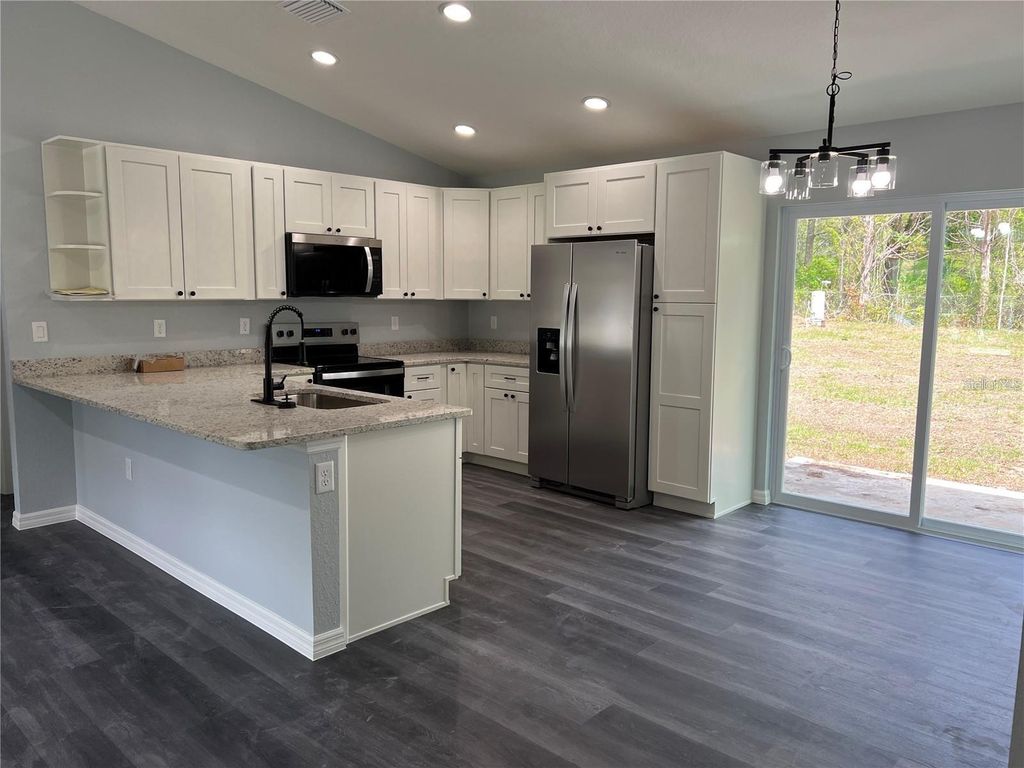 Photo of 19832 SW Marine Boulevard, Dunnellon, FL 34431 (MLS # OM725538)