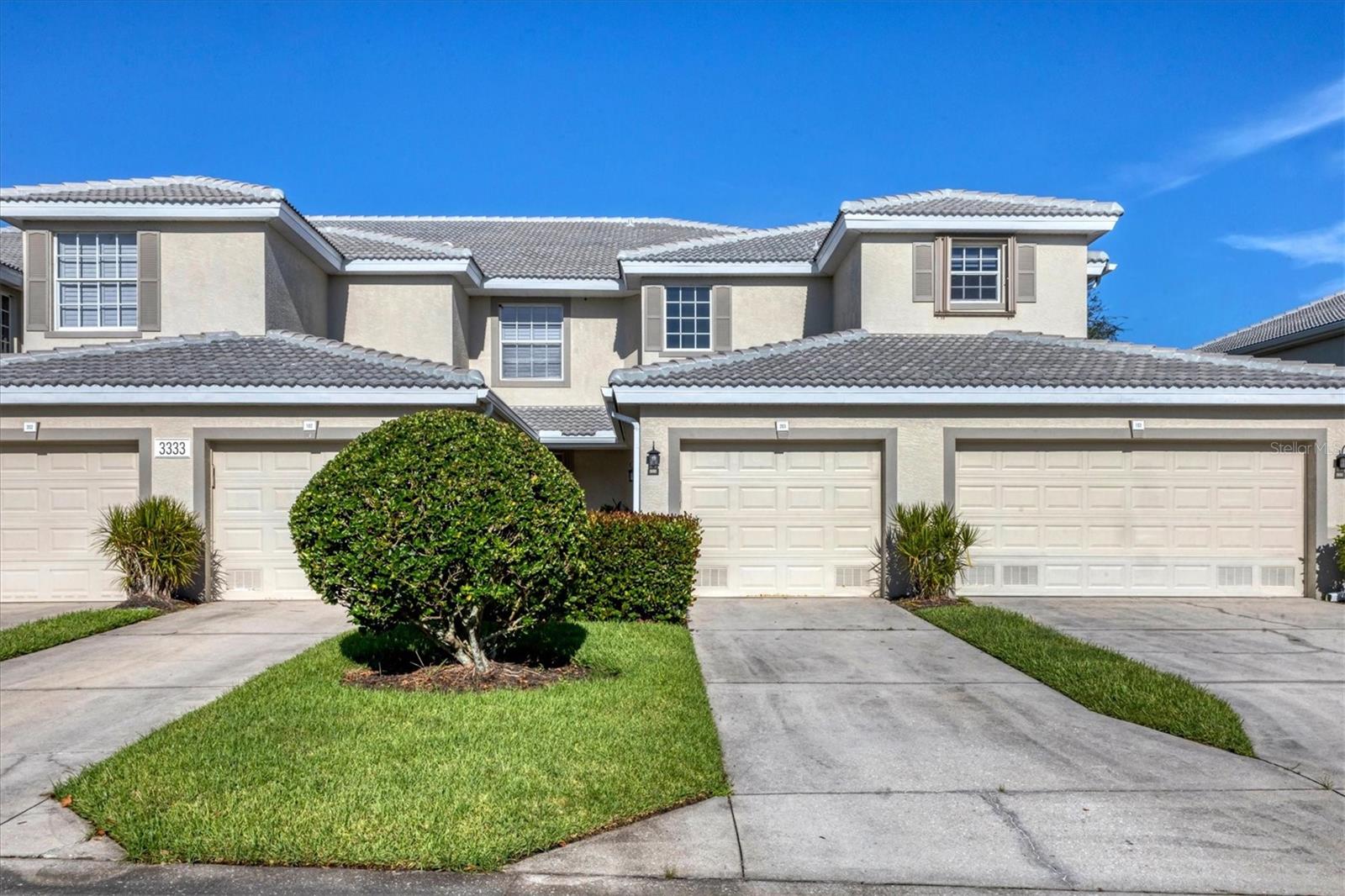 Nature abounds in the beautiful guard gated, golfing community of Riverwood. Rare fid of a 3 bedroom unit has foyer and stairway on first floor that leads to all living areas on 2nd floor of unit. At top of stairs you have an open "bonus room" perfect for formal dining if you so desire or whatever your imagination can dream up. Popular layout of living/dining room combo that flows effortlessly to your kitchen with raised panel cabinets and granite counter tops. Tile is throughout hoe with exception of wood laminate in all bedrooms. Primary bedroom has en suite that boasts garden tub, dual sinks and step in shower. To enjoy the mornings or end of day you can lounge on your screened lanai and enjoy what natures has to offer each day and views of the golf course. Enough amenities in this community (some with add'l costs) to keep you as busy as you choose to be including pool, tennis, fitness and more. Riverwood is situated centrally to Port Charlotte and North Port where you can enjoy spring training venues for Tampa Bay Rays or Atlanta Braves, as well as the Gulf beaches of Englewood/Manasota Key, shopping, dining, boating and more. As of this listing date the most affordable unit on the street. Call for your viewing today!!