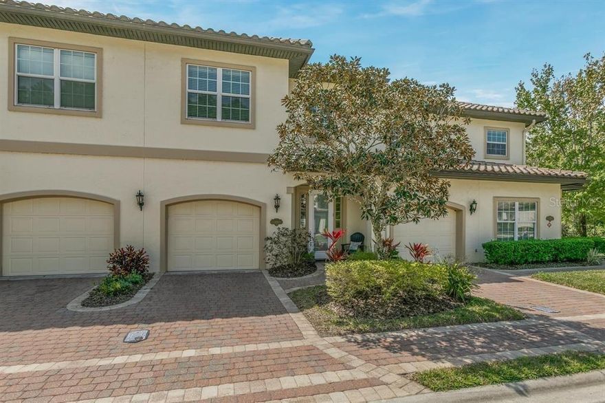 This is more than a home; it’s a lifestyle. Experience the best of St. Augustine living in this stunning Mediterranean-style Condo, perfectly nestled against a lush conservation preserve. This 3-bedroom, 2-bathroom residence offers the rare combination of peaceful seclusion and incredible proximity—located just minutes from the pristine beaches of Anastasia Island, premier shopping, and the vibrant, historic heart of Downtown St. Augustine. Boasting nearly 1,900 sq. ft. of thoughtfully designed living space, this home impresses from the moment you step into the grand 20-foot soaring entry. Highlights include: A chef’s dream featuring granite countertops, 42” cabinetry, upgraded lighting, and a stainless steel appliance package with a gas range. Enjoy the airy feel of 10-foot ceilings throughout, complemented by adult-height vanities and generous closet space in every bedroom. Move in with peace of mind thanks to a BRAND NEW AC system and a high-efficiency tankless gas water heater. Step through the kitchen or living room to your expansive screened lanai (24’ x 7’). This is where "home" feels like a vacation, offering breathtaking, unobstructed views of the lake and nature preserve. The exterior features classic S-style Spanish concrete roof tiles and a paver driveway. Best of all, the HOA maintains the landscaping and automatic sprinklers, leaving you more time to enjoy the beautiful community pool just a short stroll away. ***Schedule your showing today!***