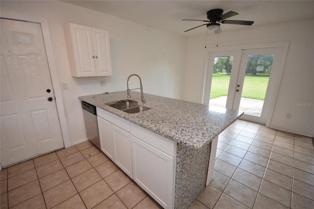 Photo of 10224 Matchlock Drive, Orlando, FL 32821 (MLS # O6450649)
