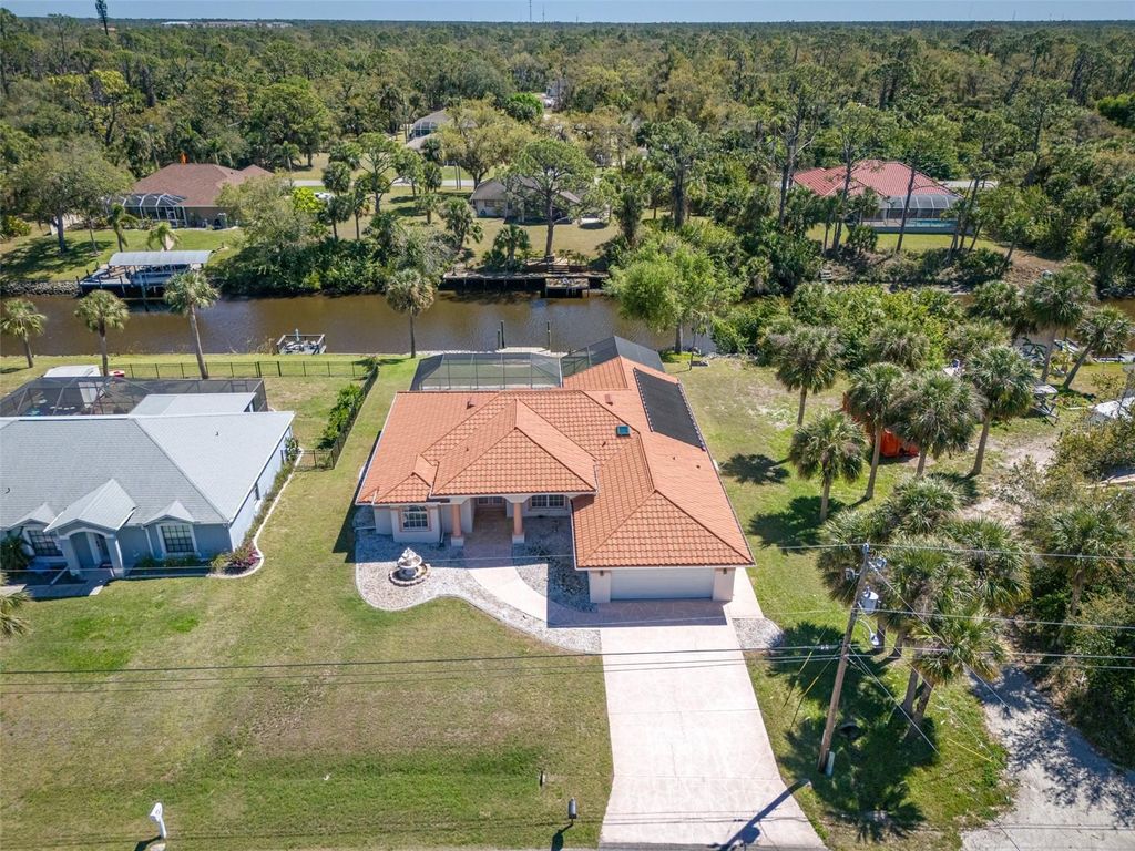 Photo of 108 Mccabe Street, Port Charlotte, FL 33953 (MLS # TB8419621)