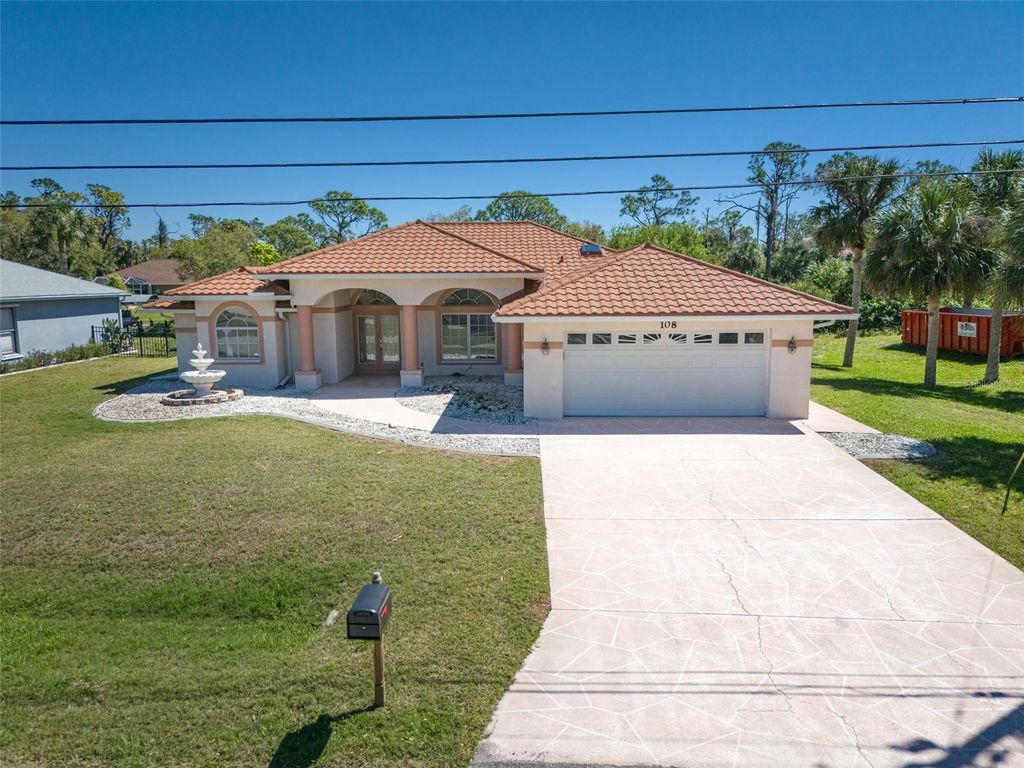 Photo of 108 Mccabe Street, Port Charlotte, FL 33953 (MLS # TB8419621)