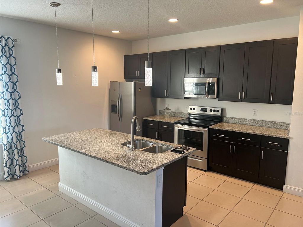 Photo of 312 Clearwater Lane, Kissimmee, FL 34759 (MLS # O6361443)