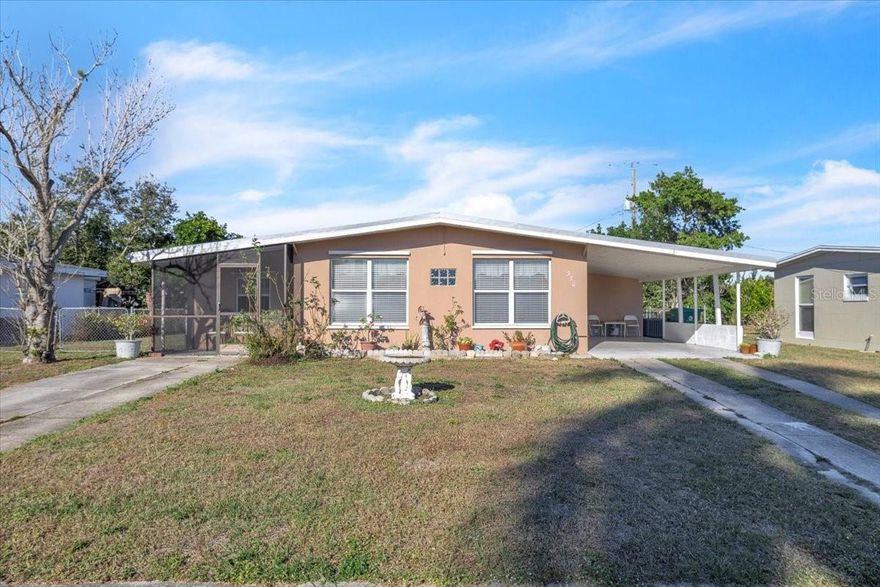 Perfect opportunity to own this charming 3-bedroom, 2-bathroom single-family home located in the heart of Port Charlotte. Major updates include a new metal roof (2023), new A/C system (2022), PEX plumbing re-pipe completed in 2019, and a water heater replaced in 2017—providing peace of mind for years to come. This home offers 1,004 square feet of living space and features a spacious, fully fenced backyard, ideal for pets, play, or outdoor enjoyment. A screened-in front porch welcomes you and provides access to the home’s 12x11 bonus room, offering flexible space ideal for a home office, hobby room, or additional sitting area. An inviting open-concept floor plan welcomes you inside, complemented by a mix of carpet and tile flooring throughout for comfort and easy maintenance. Bright and welcoming, this well-kept kitchen offers a functional layout with abundant storage and charming character. Light wood cabinetry surrounds the space, providing exceptional floor-to-ceiling storage, while crisp white appliances—including a full-size refrigerator and electric range—create a clean, cohesive look. Neutral countertops and easy-to-maintain tile flooring enhance practicality. A cheerful turquoise accent wall adds a refreshing pop of color and beautifully complements the natural light streaming in. A side door opens directly to the covered carport, offering convenient access for unloading groceries or stepping outside with ease. Compact yet efficient, this inviting kitchen is designed for everyday comfort and convenience. The spacious primary suite offers ample room for a sitting area and features a private bathroom with a handicap-accessible walk-in shower, single-sink vanity, and linen closet. Two additional bedrooms and a full guest bathroom provide comfortable accommodations for family and guests. The attached covered carport provides shaded, weather-protected parking and a convenient, covered entry into the home. It also offers flexible space for additional storage or light outdoor projects and includes access to an interior laundry room complete with washer and dryer. Step outside to relax on the outdoor patio overlooking the backyard, which also features a 120-square-foot storage shed—perfect for tools, equipment, or extra storage. Hurricane shutters provide added peace of mind. Centrally located near shopping, dining, schools, golf courses, beautiful Gulf beaches, and major roadways including US-41 and I-75. 
**PLEASE ENJOY THE 3D INTERACTIVE VIRTUAL TOUR ASSOCIATED WITH THIS LISTING**