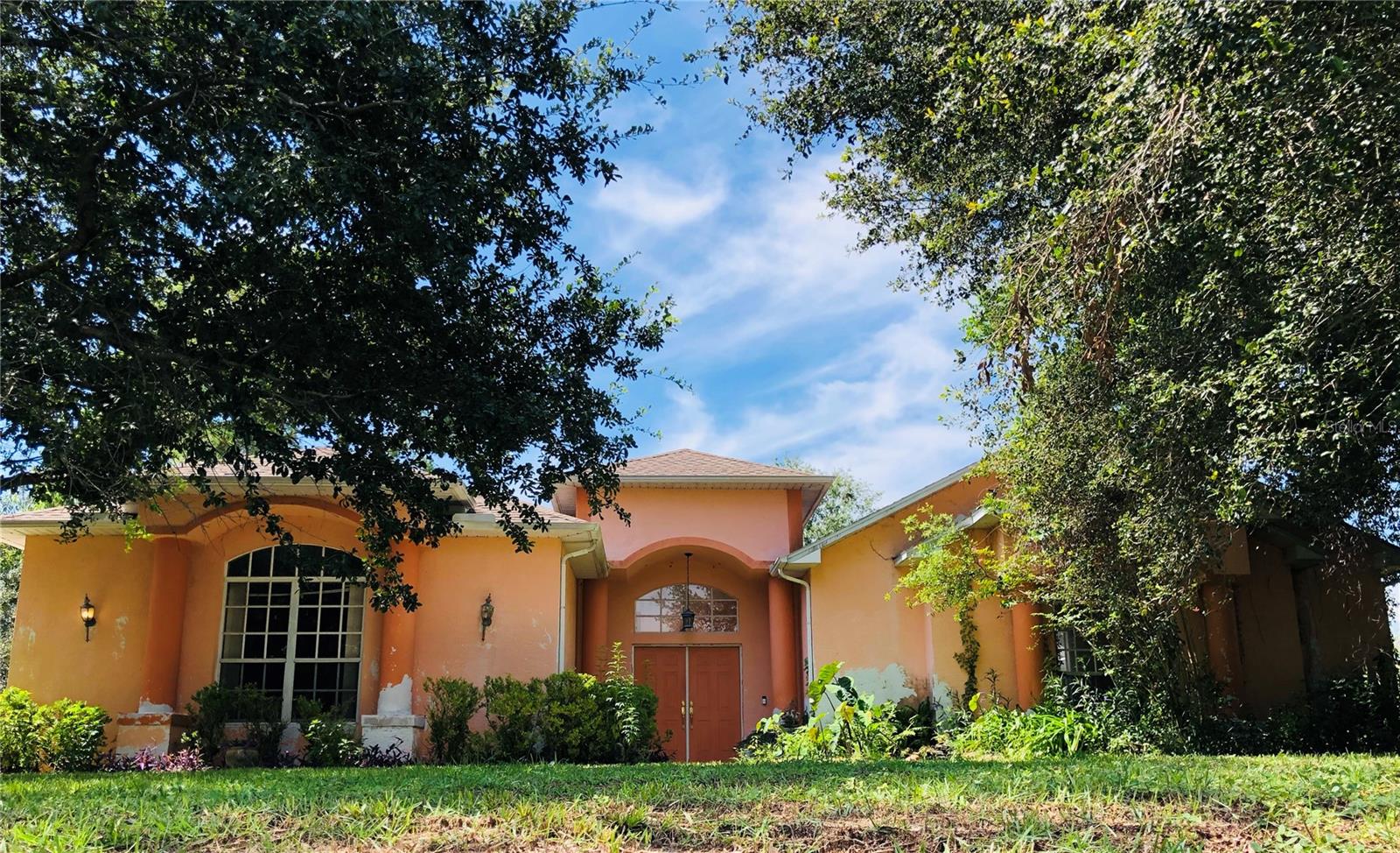 This 3 bedroom, 3 bathroom, 2 car garage pool home sits on over a half acre corner lot. This cabana style pool home is THE ULTIMATE house for entertaining family and friends. It has over 2,500 square feet of living area and features a separate third bedroom/in-law suite. When you enter the home, you are greeted by a custom designed pool complimented by a water feature. The patio/lanai area is covered by brick pavers, surrounded by sliding glass doors, and has plenty of covered area to provide cool shade on a hot summer day. The main living area is an open concept. The living room has an electric fireplace complete with a wooden mantle. The kitchen has stainless steel appliances, an island for food prepping, an abundance of cabinet space, and a walk in pantry. Off of the kitchen, you find a flex/office space with a sliding pocket door. The primary bedroom features sliding glass doors with a view of the pool and a large bathroom with a walk in shower, claw tub, and a separate water closet. Bedroom number two is large in size and is also accompanied with a bathroom. The third bedroom could be used as an in-law suite or even guest quarters. It has a full bathroom with pool door access and privacy from the main living areas. The two car garage is very large with room on both sides for storage and/or a workshop area and has an entrance to the home through the indoor laundry room. The property has a fully fenced backyard, concrete landscape curbing, mature trees, solar system installed in 2019 and A/C in 2019. Located in the heart of Spring Hill, close to the Suncoast Parkway (Toll 589), you will have easy access to shopping, restaurants, Tampa International Airport, and award winning beaches. This home design is absolutely amazing. Take advantage of this opportunity to live a true Florida lifestyle, Welcome home!