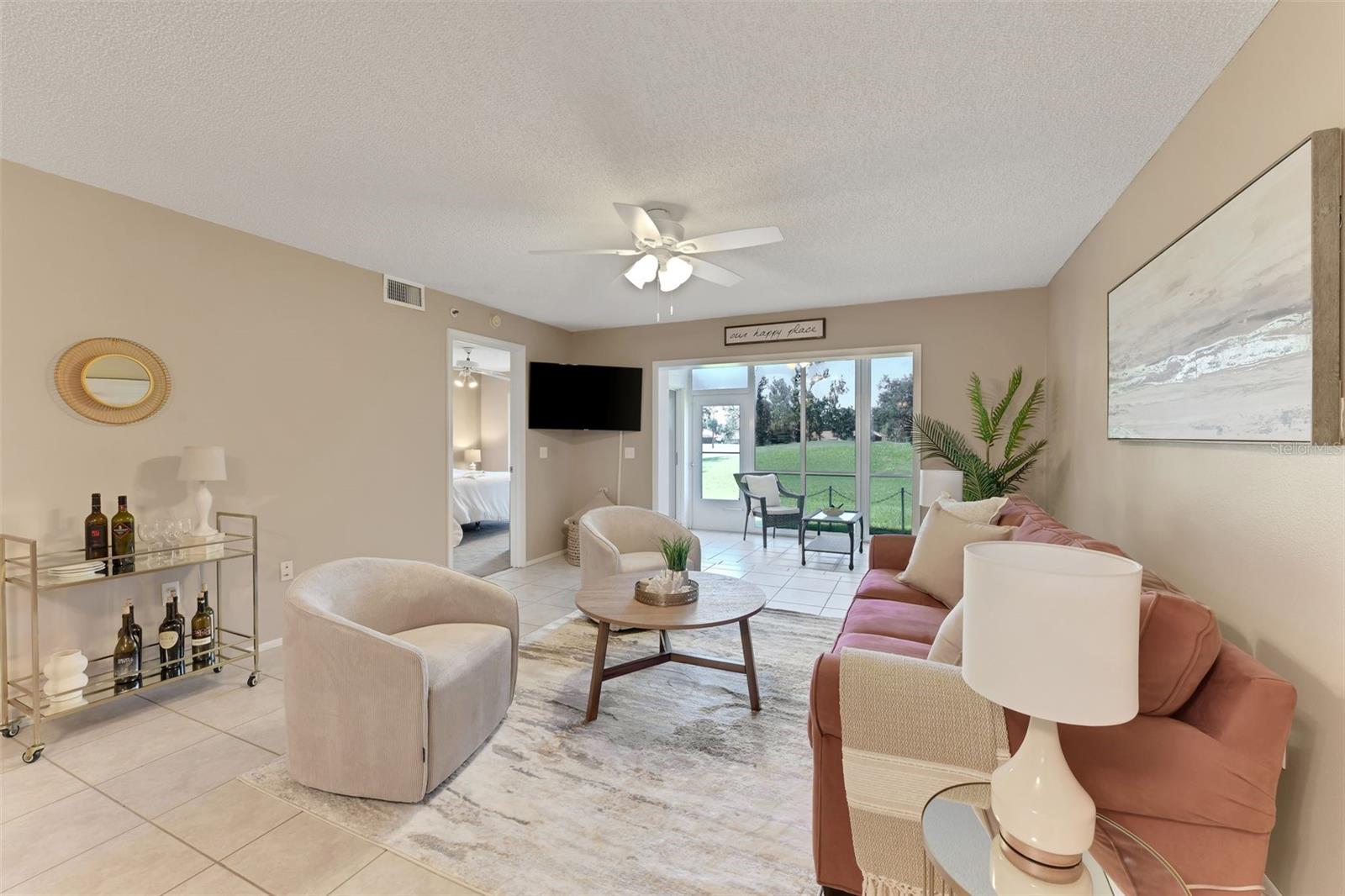 Resort-Style Living on the Golf Course! Welcome home to this beautifully maintained first-floor condo with no steps to climb in the Villages at Tara, one of Bradenton’s most desirable country club communities. This 2 bedroom, 2 bath residence is designed for comfort and everyday ease. The kitchen flows naturally to a screened front porch, creating the perfect spot for morning coffee or casual dining outdoors. At the rear of the home, a sunroom with floor-to-ceiling windows overlooks the lush fairways, offering a peaceful retreat for relaxing or entertaining. Inside, you’ll enjoy an open-concept living and dining area, a split bedroom plan for privacy, an in-unit laundry, and a one-car garage for added convenience. The primary suite features generous closet space and a private bath. Ownership comes with a Class A Golf Membership, granting you full access to Tara’s championship golf course, tennis courts, fitness center, resort-style pool, clubhouse dining, and an active social calendar. Just minutes from I-75, UTC shopping, restaurants, and Gulf Coast beaches, this home combines the ease of condo living with the luxury of a country club lifestyle.