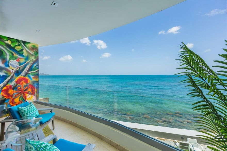This spectacular oceanfront condo conceived with contemporary architecture offering exceptional proportions and stunning ocean views. The residence is exquisitely designed throughout 3,231 square feet, configured with three bedrooms each with a full bathroom, and one half bathroom, elegant marble floors throughout and a covered terrace in the main bedroom with direct ocean views.

The open floor plan seamlessly integrates the living, dining, and kitchen areas, offering open ocean views and beautiful sunsets. The fully equipped gourmet kitchen features sleek cabinetry, calacatta stone countertops, stainless-steel appliances and a wine cellar with a beer keg dispenser.

Wake up to the gentle sound of waves and be mesmerized by the enchanting ocean views that stretch as far as the eye can see. The floor-to-ceiling windows and  terrace ensure that you will never miss the beauty of the surroundings. This condo comes with 3 parking spaces.

Azure Beach is a resort-style development in Punta Las Marias next to Condado, on the gated street Calle Almendro. Residents of Azure Beach enjoy the most impressive roof-top of any development in San Juan that includes an infinity pool and spacious open and covered terraces and and bar and grill outdoor kitchen. Seat and relax to witness dramatic sunrises and sunsets. The development offers a full power generator and water cistern.