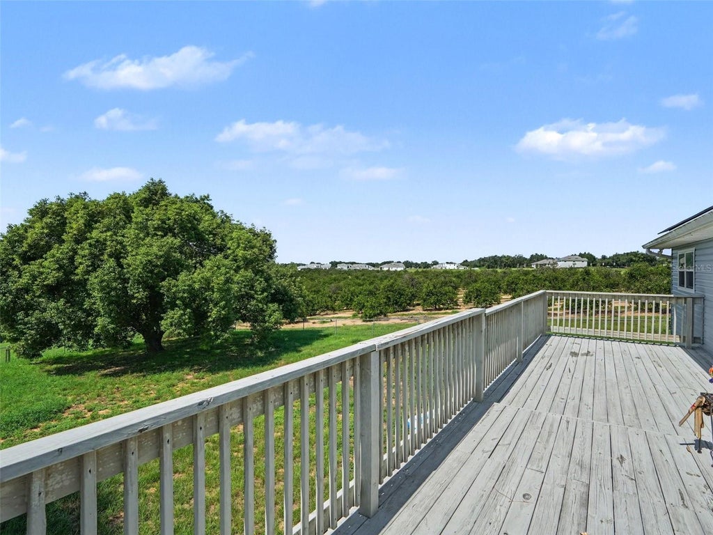 Photo of 705 Lake Ada Boulevard, Dundee, FL 33838 (MLS # TB8547905)