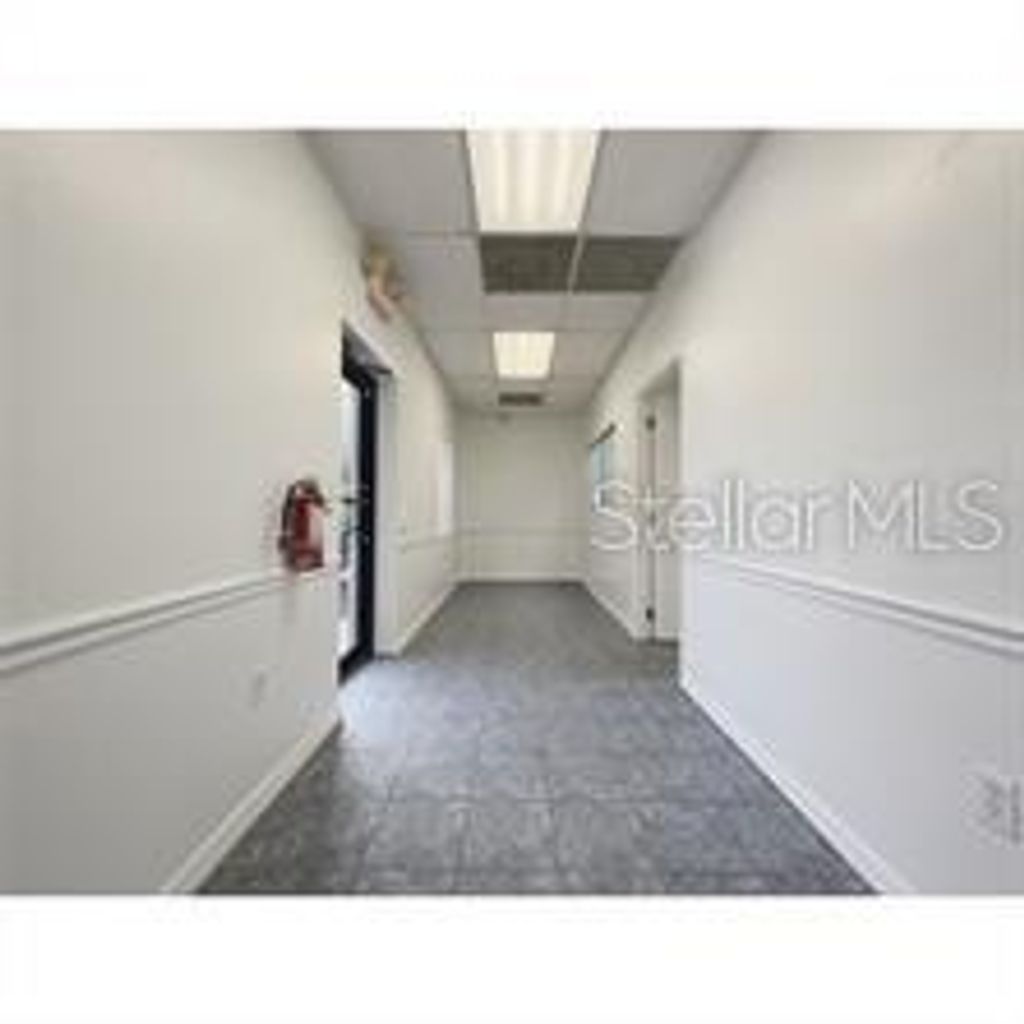 Photo of 7216 Chancery Lane #100, Orlando, FL 32809 (MLS # O6407603)