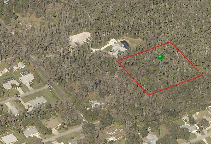 Build your dream home on this beautiful 2.5 acre parcel located in Corbin Park. This property is centrally located and close to shopping, restaurants and the beautiful beach. Close to interstate for easy commuting. Buyer to perform own due diligence to deem lot satisfactory for individual needs. Survey available.; Cleared: No