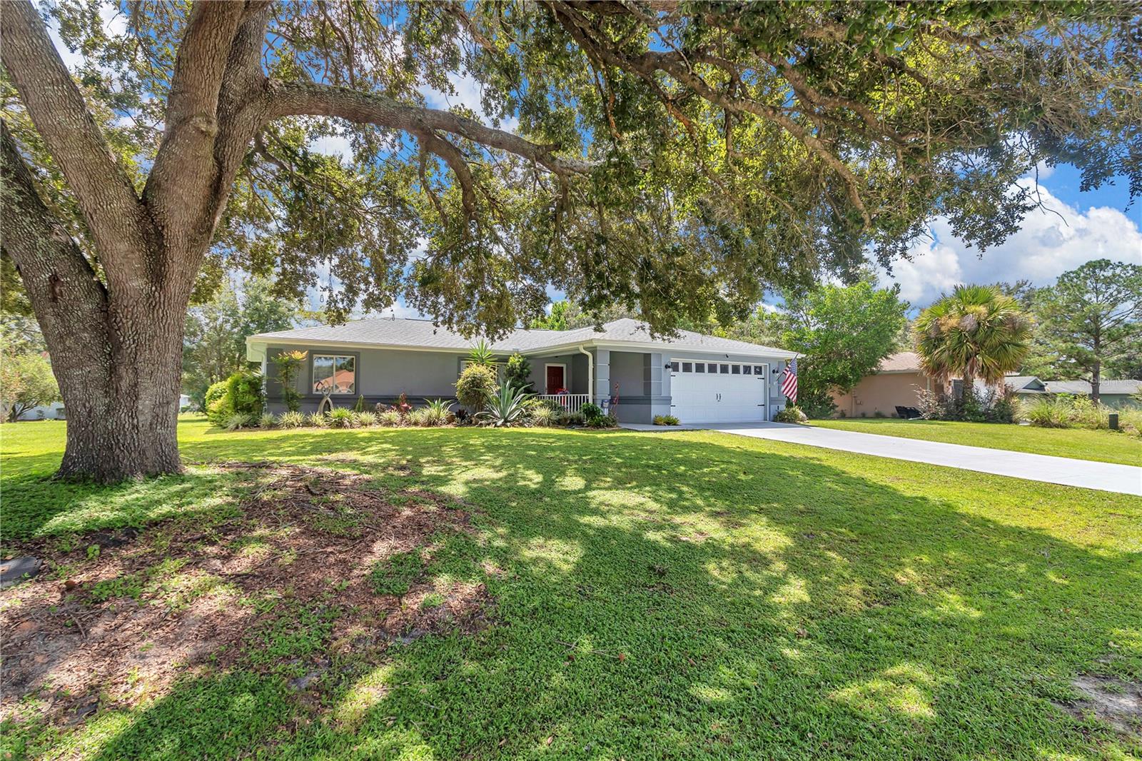 UPDATED CONCRETE STUCCO BLOCK HOME IN LOVELY CHERRYWOOD ESTATES A 55+ COMMUNITY FEATURING HEATED POOL AND SPA, FITNESS CENTER AND CLUBHOUSE WITH ENDLESS CLUBS AND THINGS TO DO INCLUDING AN ABUNDANCE OF OUTDOOR ACTIVITIES TO STAY ACTIVE! MATURE LANDSCAPING WITH A GORGEOUS OAK AS THE CENTERPIECE OF THE FRONT YARD. STEP INTO FRONT COVERED ENTRY TO INVITING AND SPACIOUS HOME. LIVING ROOM HAS VAULTED CEILINGS AND OVERLOOKS TO DING AREA WITH MODERN WAYNES COATING. THE KITCHEN HAS 2021 STAINLESS STEEL APPLIANCES, NEW GRANITE COUNTERTOPS AND A PENNISULA ISLAND WITH ROOM FOR UP TO 3 BAR STOOLS. THERE IS AN AREA FOR A BREAKFAST NOOK IN KITCHEN AS WELL. THIS SPLIT BEDROOM HOME HAS PRIMARY BEDROOM ON RIGHT HANDSIDE OF HOME WITH BARN DOOR ENTRY TO UPDATED BATHROOM WITH MODERN TILE SURROUND, WALK IN SHOWER. THERE IS A WALK IN CLOSET AS WELL. ACROSS THE HOME IS 2 ADDITIONAL SPACIOUS BEDROOM SHARED THE 2ND BATH. STEPPING OUTSIDE OF THE SLIDING GLASS DOOR FROM THE DINING IS A COVERED AND SCREENED LANAI OVERLOOKING BACK YARD. 2021 GAF HDZ - HIGH WIND,SPEED PROTECTED ROOF, TRANE HVAC 3 TON 2021, AND HOT WATER HEATER 2009. LUXURY VINYL PLANK FLOORING 2021. 2 CAR GARAGE AND HOME TO THE LAUNDRY AREA. RAIN GUTTERS ON EXTERIOR, NEW LIGHTING IN HOME AND 2022 INTERIOR AND EXTERIOR PAINT. GREAT LOCATION AND PRICED TO SELL!