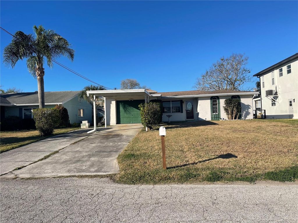 Photo of 7601 Hatteras Drive, Hudson, FL 34667 (MLS # TB8470295)