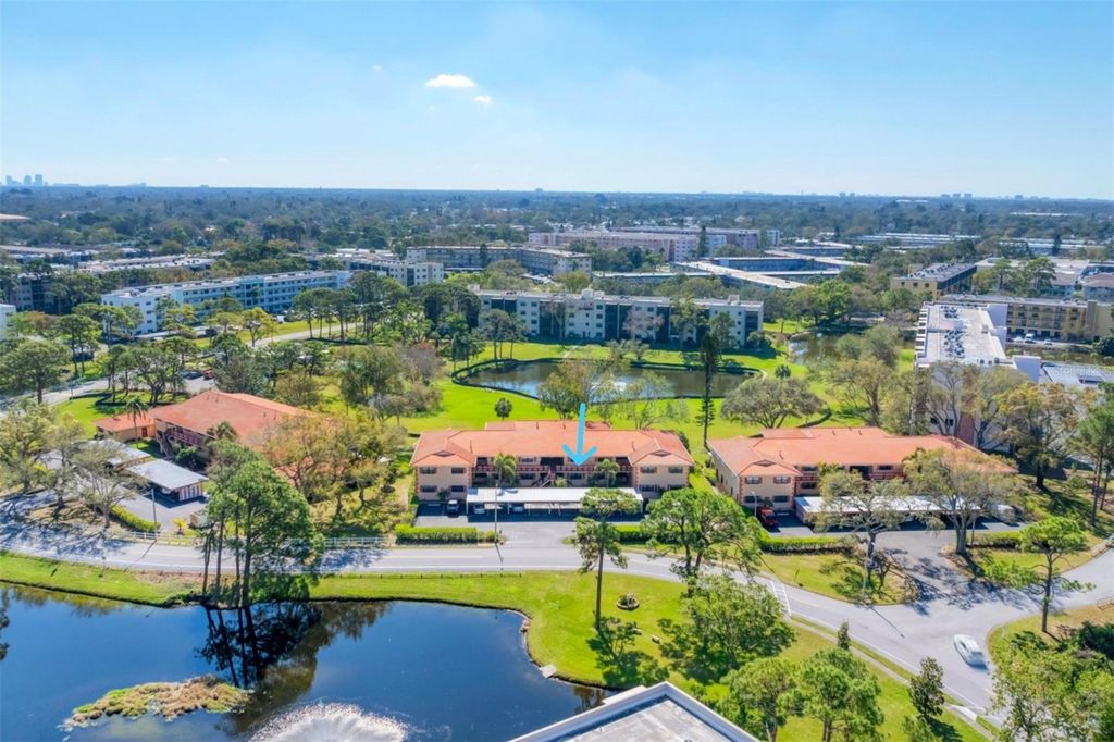 Photo of 8140 Terrace Garden Drive N #103, St Petersburg, FL 33709 (MLS # A4666913)