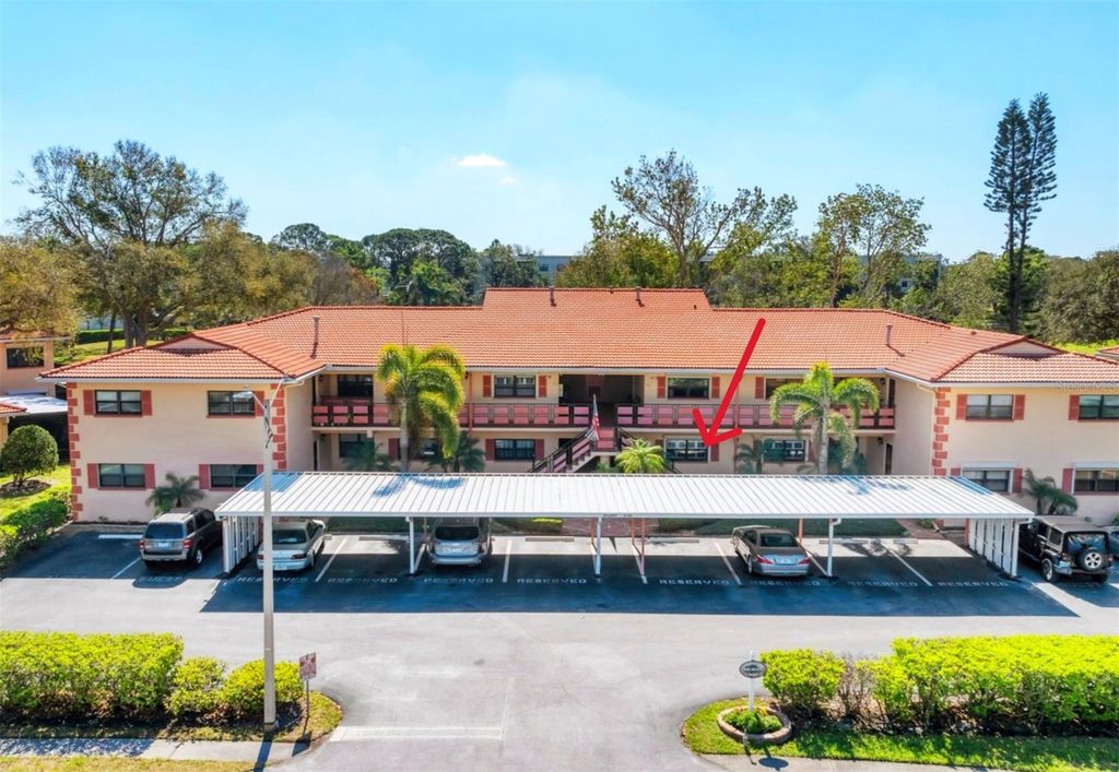 Photo of 8140 Terrace Garden Drive N #103, St Petersburg, FL 33709 (MLS # A4666913)