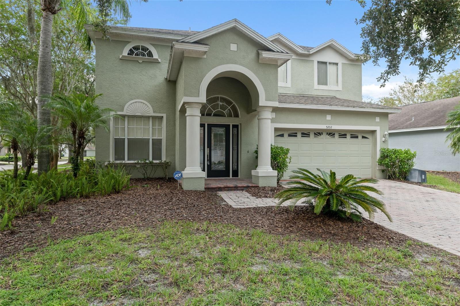Rare Executive 4-Bed, 3.5-Bath Home in Tampa Palms – Move-In Ready! Located in the highly desirable Tampa Palms community, this stunning two-story home offers elegance, comfort, and convenience. Just minutes from USF, Moffitt Cancer Center, major highways, and Club Tampa Palms amenities, you’ll enjoy access to pools, fitness facilities, tennis, basketball, and more. Situated on a beautiful corner lot, this home features an inviting cut-glass entry, soaring ceilings, wood floors, and a thoughtfully designed floor plan. The chef’s kitchen, formal dining area, and spacious living room flow perfectly for entertaining, with sliders leading to your private backyard. Upstairs, you’ll find four bedrooms and three full baths, including a luxurious master suite with a versatile sitting area. Added bonuses: exterior repainted in 2019, no flood zone, and no storm damage.