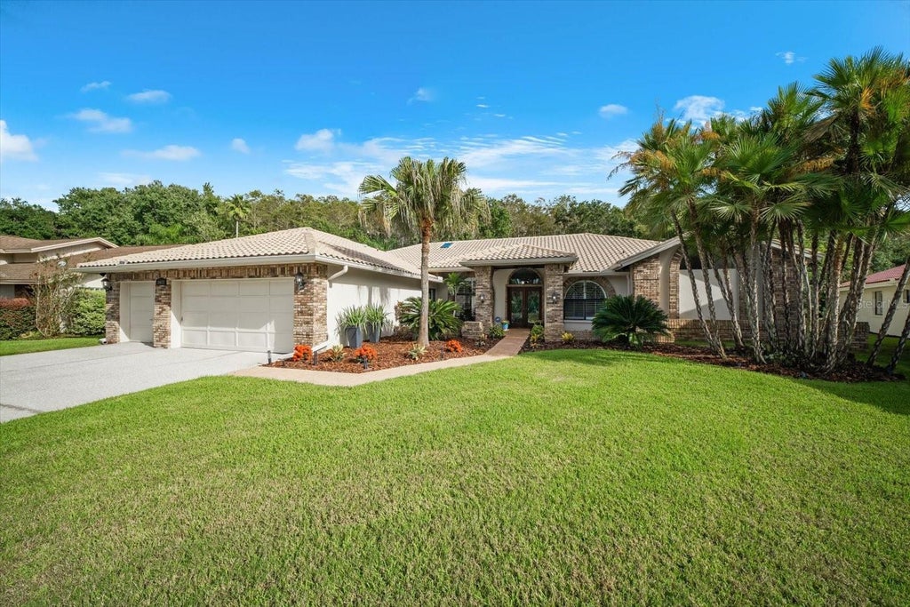 Photo of 3612 Windber Boulevard, Palm Harbor, FL 34685 (MLS # TB8546926)