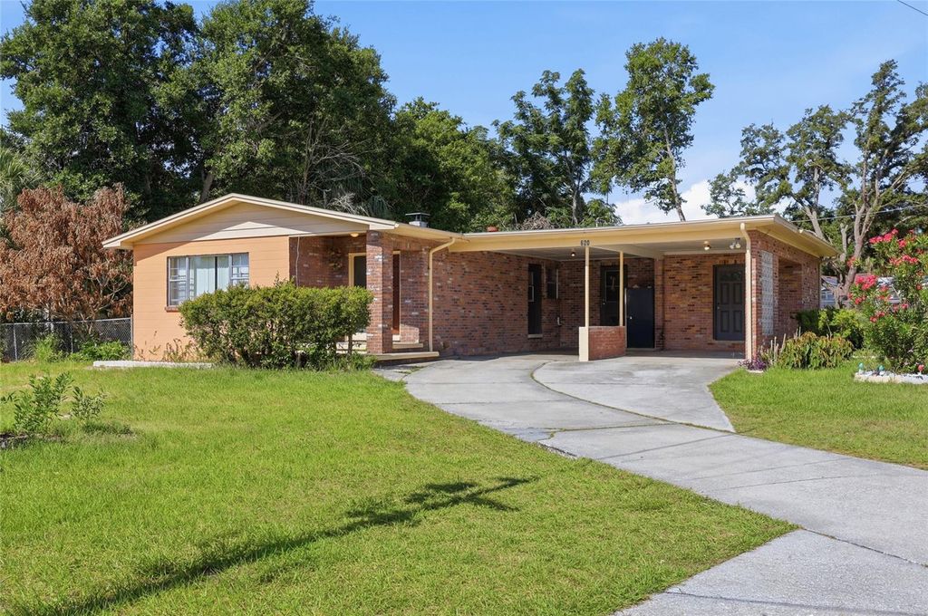 Photo of 620 W Cummings Street, Lake Alfred, FL 33850 (MLS # O6415315)