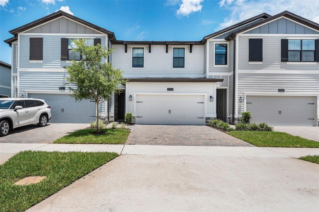 Photo of 11043 Whistling Pine Way, Orlando, FL 32832 (MLS # O6438033)
