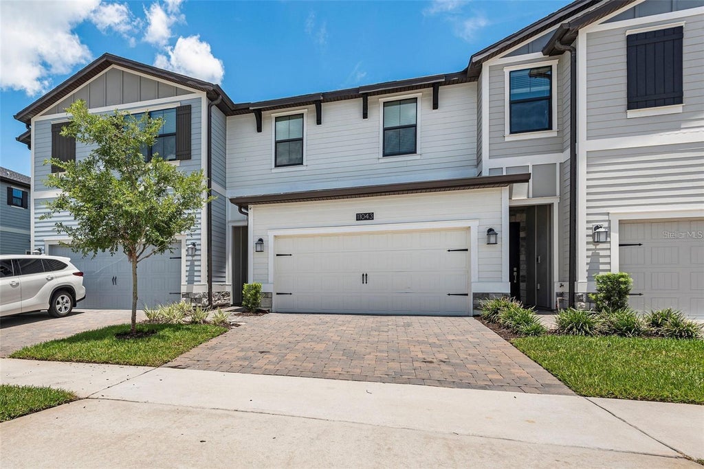Photo of 11043 Whistling Pine Way, Orlando, FL 32832 (MLS # O6438033)