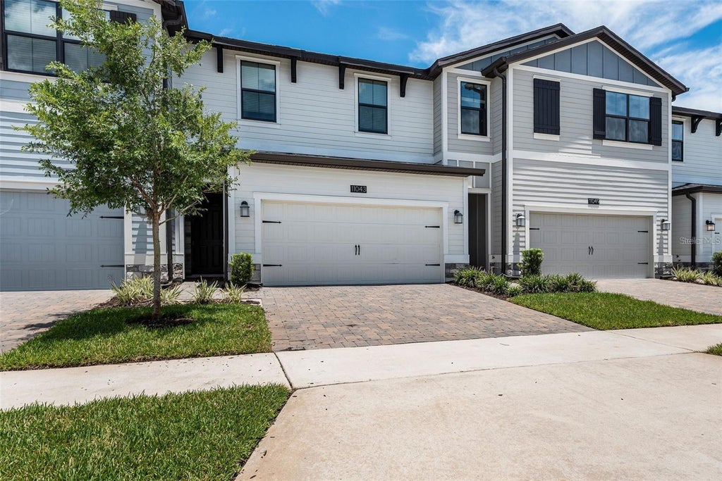 Photo of 11043 Whistling Pine Way, Orlando, FL 32832 (MLS # O6438033)