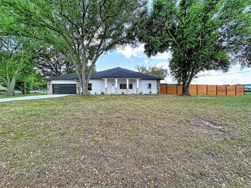 $25,000 BELOW APPRAISED VALUE – 4 Bedroom, 3 Bath Estate on Over an Acre in Wesley Chapel

Welcome to a truly one-of-a-kind 4 bedroom, 3 bathroom, 3 car garage property where modern luxury meets space, privacy, and versatility. Completely remodeled from the frame out, this home delivers the feel of new construction while preserving the charm and freedom of an established acreage setting.

Situated on a spacious corner lot of over one acre, you’ll enjoy room to breathe, expand, and create the lifestyle you want — without HOA restrictions limiting your vision.

Inside, the home has been thoughtfully redesigned with a bright, open-concept layout that blends comfort and sophistication. High-end finishes are found throughout, including brand-new quartz countertops, custom fixtures, fresh interior and exterior paint, updated electrical wiring, and carefully selected details that elevate every space.

The flexible 4-bedroom layout offers room for guests, a home office, or multigenerational living, while the 3 full bathrooms have been beautifully updated with modern finishes.

Parking and storage are exceptional: the home features an attached 2-car garage plus a large detached garage that can accommodate 1–2 additional vehicles. Whether you need space for a workshop, car collection, recreational vehicles, business equipment, or future conversion into an ADU or guest suite, this property delivers unmatched flexibility.

Major systems have already been addressed for true peace of mind:
• New roof (2023)
• Brand-new A/C (2026)
• Fully updated interior systems (2026)

The fully fenced lot adds privacy, security, and functionality — ideal for pets, outdoor entertaining, or simply enjoying the freedom of owning over an acre of land.

With virtually everything new and located in one of Tampa Bay’s fastest-growing areas, this is a rare opportunity to own a turnkey home on acreage with built-in equity from day one.

Homes with this combination of renovation quality, land, garage space, and flexibility rarely come available. Schedule your private showing today.