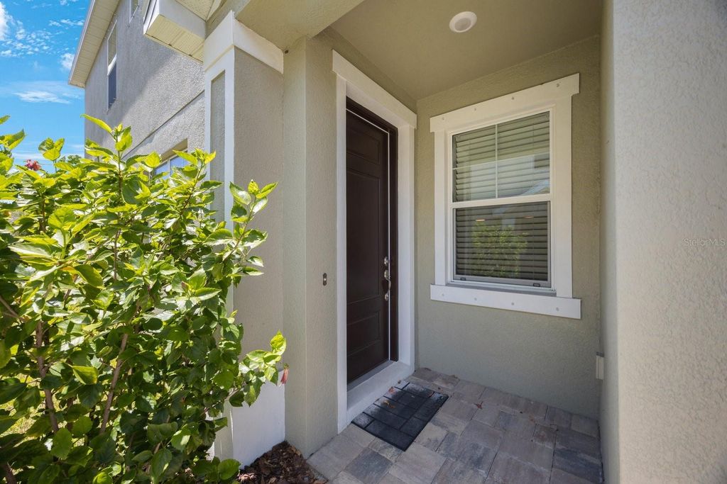 Photo of 1897 Trailside Drive, Palm Harbor, FL 34683 (MLS # TB8387735)