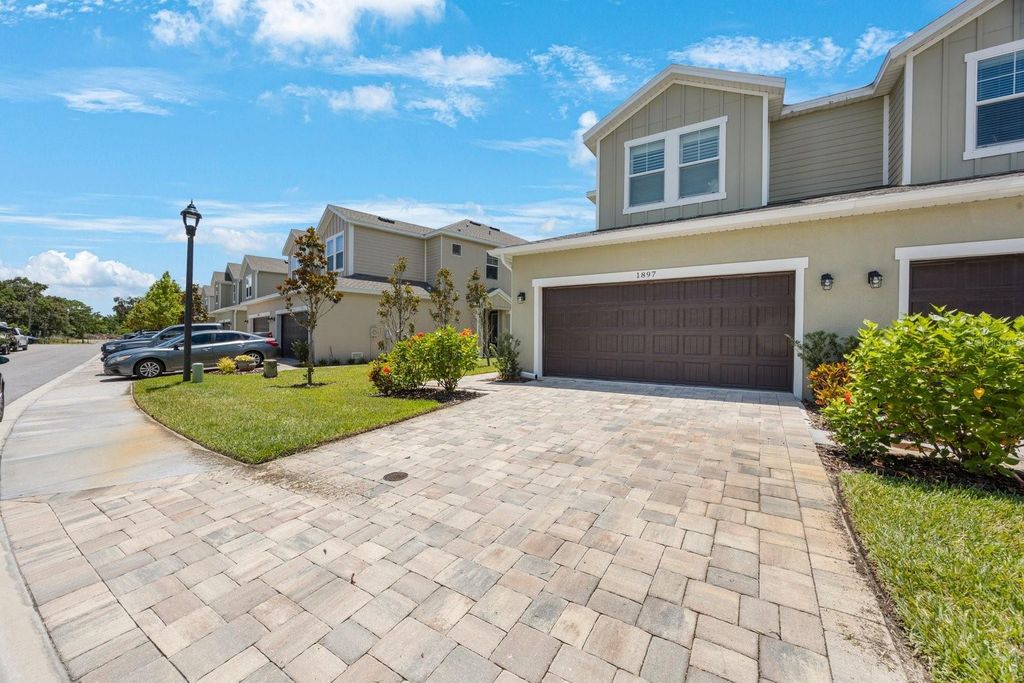 Photo of 1897 Trailside Drive, Palm Harbor, FL 34683 (MLS # TB8387735)