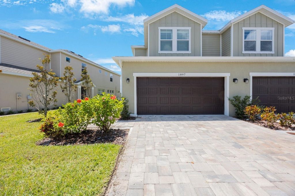 Photo of 1897 Trailside Drive, Palm Harbor, FL 34683 (MLS # TB8387735)