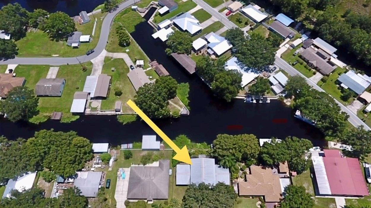 Welcome to 80 Perch St, a rare opportunity to create your two story dream home or retreat in a prime waterfront location! Nestled on the desirable Kissimmee Chain of Lakes, this expansive property offers over 4,500 sq. ft. of structure ready for transformation. This is not a finished home—bring your tools, vision, and creativity to breathe new life into this space. Although it does have a nice metal roof and it is dried in. The current structure requires a full rehab and clean-out, but the bones are there for something truly special. Inside, you’ll find a wealth of building materials already on-site—from doors and windows to cabinets and a bathroom shower stall—a valuable head start for your renovation project. Whether you're looking to build your own lakeside retreat or invest in a unique property with tons of upside, this is a golden opportunity to start fresh in a highly sought-after waterfront community. Don’t miss your chance to make this blank canvas your masterpiece.
