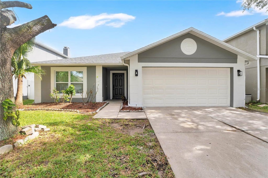 Photo of 531 Flower Fields Lane, Orlando, FL 32824 (MLS # O6438823)
