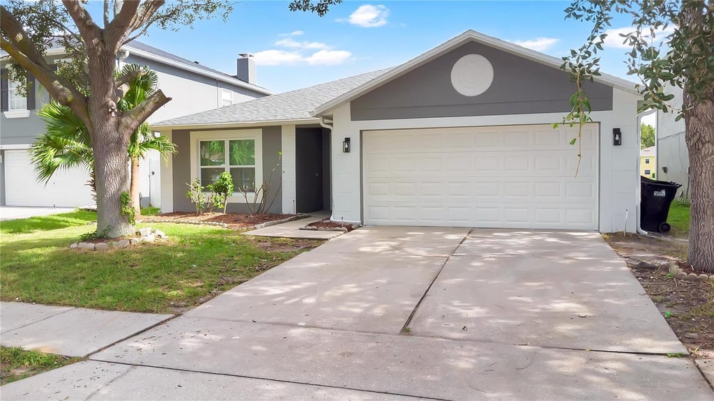 Photo of 531 Flower Fields Lane, Orlando, FL 32824 (MLS # O6438823)