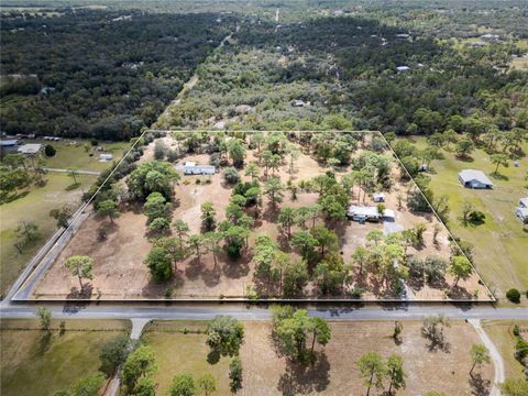 Photo of 4982 W Woodlawn Street, Dunnellon, FL 34433 (MLS # OM709746)
