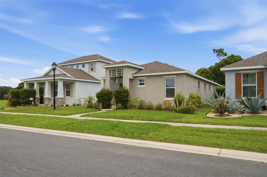 Photo of 3121 Rocky River Road, Kissimmee, FL 34746 (MLS # O6431199)